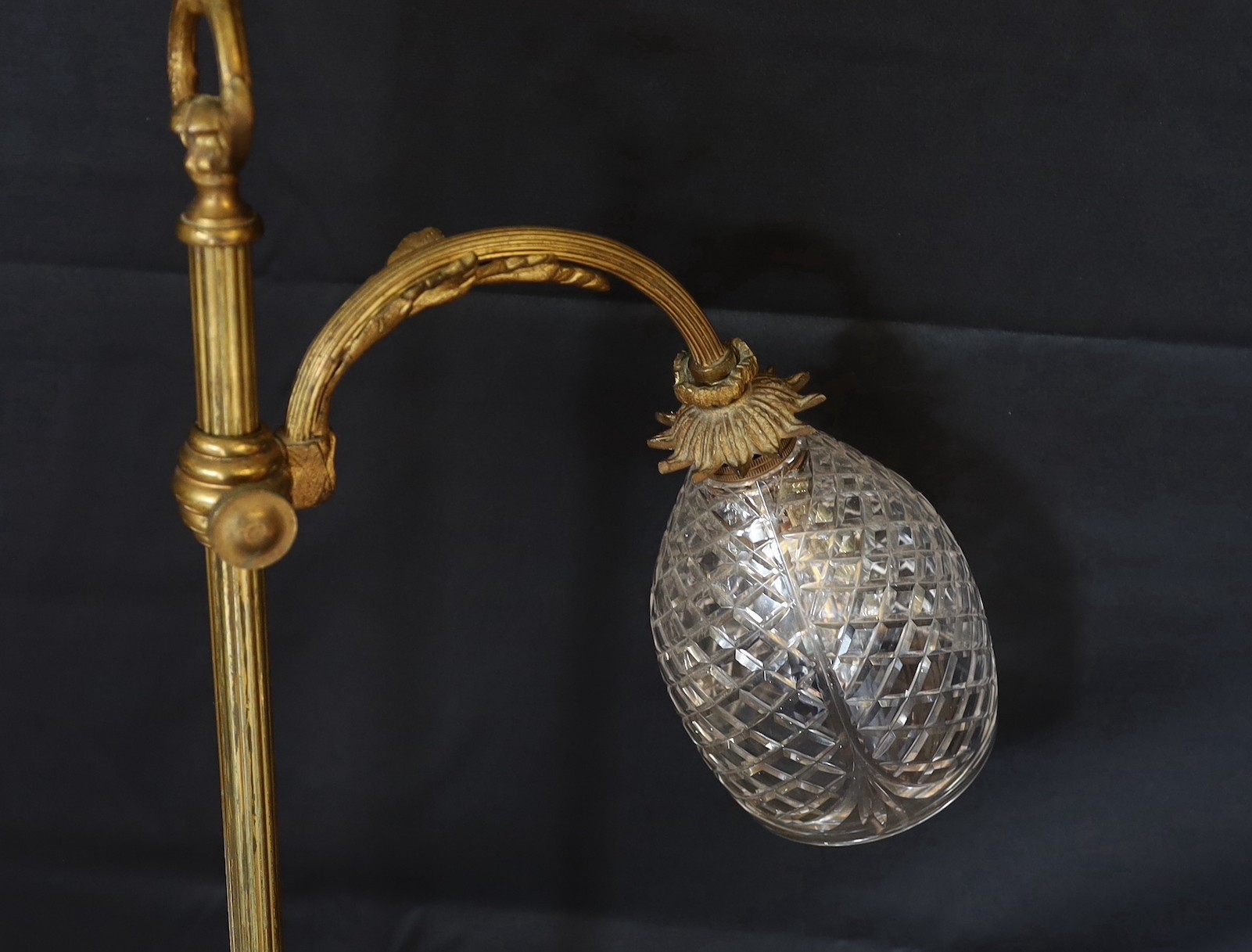 An early 20th century French ormolu and cut glass adjustable desk lamp, in the manner of Risa and Hall, height 62cm